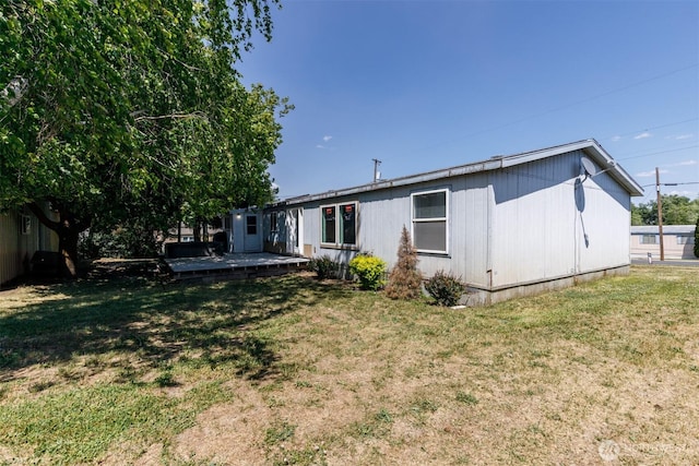 212S 3rd St, Almira, WA 99103 - rear view of property with a yard