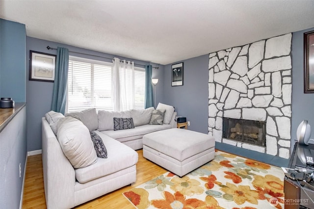 1938 66th Ave NE, Tacoma, WA 98422 - living area with wood finished floors and a fireplace
