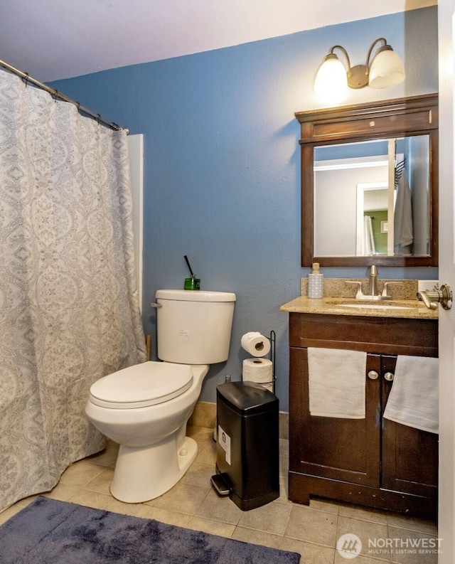 1938 66th Ave NE, Tacoma, WA 98422 - bathroom with tile patterned floors, vanity, and a shower with shower curtain
