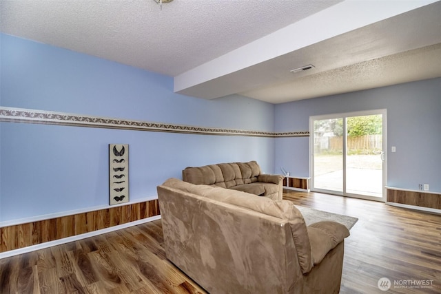1938 66th Ave NE, Tacoma, WA 98422 - living room with wood finished floors and a textured ceiling