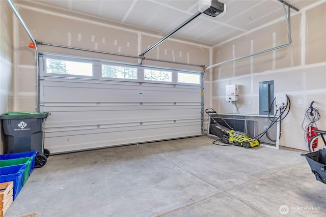 4561 Albatross St, Port Townsend, WA 98368 - garage featuring electric panel and a garage door opener