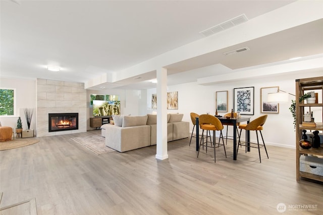 604 N 178th St, Shoreline, WA 98133 - living area featuring wood finished floors and a tile fireplace