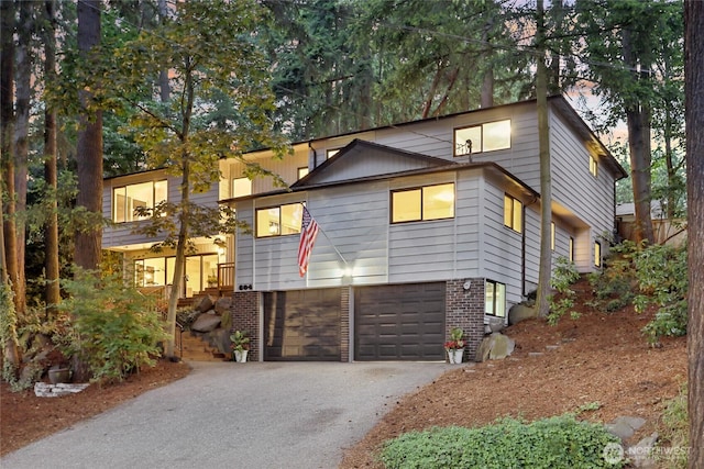 604 N 178th St, Shoreline, WA 98133 - view of front of home featuring an attached garage and asphalt driveway