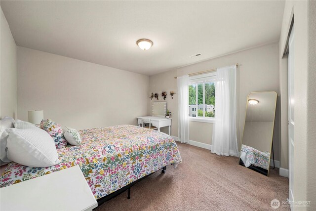 4410 Sentinel Ct, Gig Harbor, WA 98332 - carpeted bedroom with baseboards