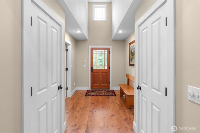 8012 105th Ave SW, Olympia, WA 98512 - entryway featuring light wood-type flooring and baseboards