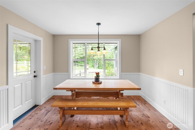 8012 105th Ave SW, Olympia, WA 98512 - dining area featuring wainscoting, light wood-style floors, a chandelier, and breakfast area