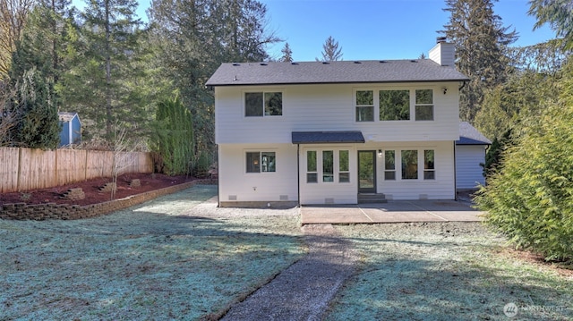 11006 325th Ave SE, Issaquah, WA 98027 - back of property with a chimney, a patio area, and roof with shingles