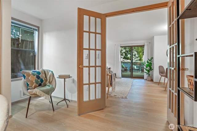 1100 E Harrison St Unit 103, Seattle, WA 98102 - interior space featuring wood finished floors and french doors