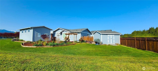 51 Sheree Ln, Sequim, WA 98382 - back of house featuring a storage unit