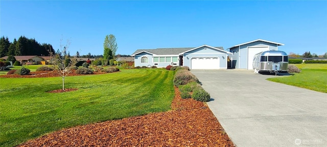 51 Sheree Ln, Sequim, WA 98382 - ranch-style home featuring concrete driveway, a front yard, and an attached garage