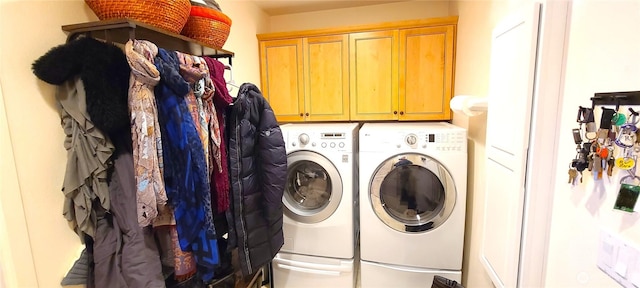 51 Sheree Ln, Sequim, WA 98382 - laundry area featuring washing machine and clothes dryer and cabinet space