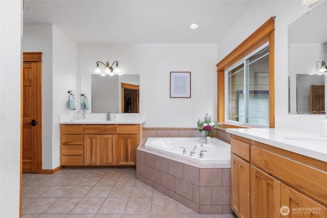 15949 159th Ln SE, Yelm, WA 98597 - full bath with two vanities, tile patterned floors, and a bath