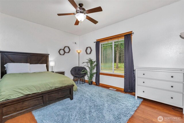 15949 159th Ln SE, Yelm, WA 98597 - bedroom with wood finished floors and ceiling fan