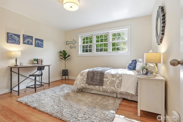 10718 12th Ave NW, Seattle, WA 98177 - bedroom featuring wood finished floors and baseboards