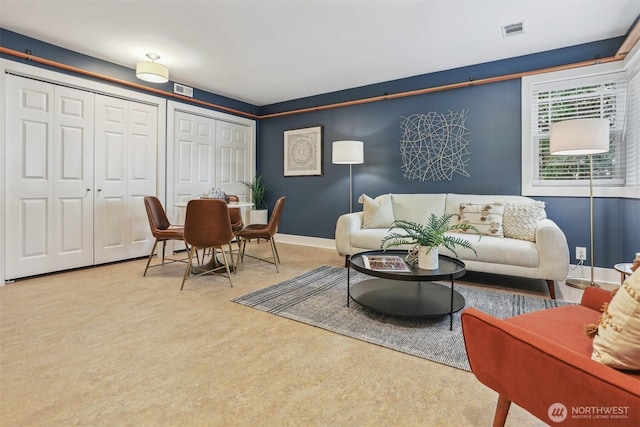 10718 12th Ave NW, Seattle, WA 98177 - living room featuring baseboards