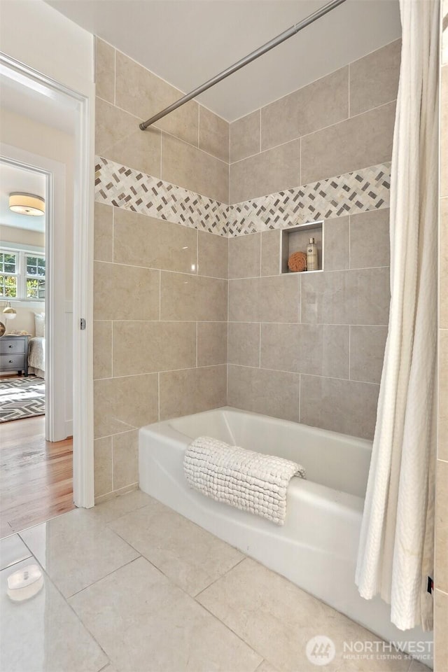 10718 12th Ave NW, Seattle, WA 98177 - full bath with shower / tub combo and tile patterned flooring