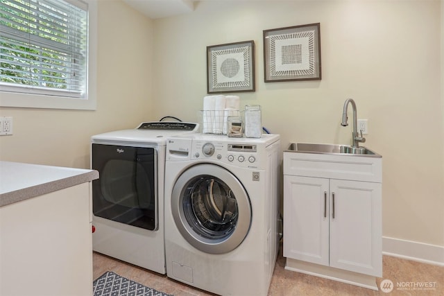 10718 12th Ave NW, Seattle, WA 98177 - washroom with cabinet space and washing machine and clothes dryer