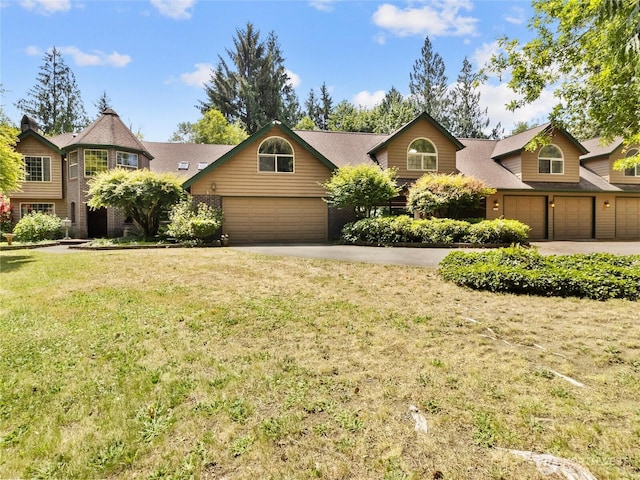 7842 Delphi Rd SW, Olympia, WA 98512 - view of front of property featuring driveway, a front lawn, and a garage