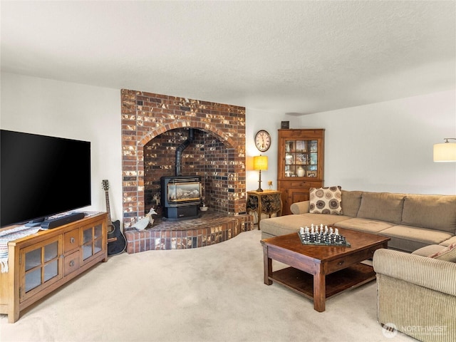 7842 Delphi Rd SW, Olympia, WA 98512 - living room featuring a wood stove, carpet floors, and a textured ceiling