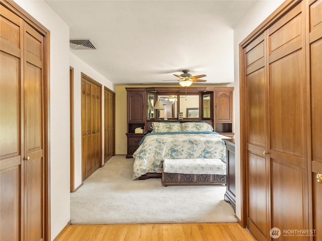 7842 Delphi Rd SW, Olympia, WA 98512 - bedroom featuring light wood-type flooring and a ceiling fan