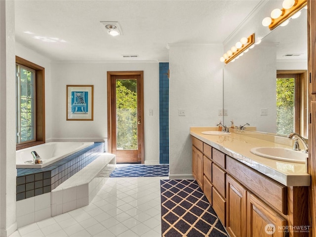 7842 Delphi Rd SW, Olympia, WA 98512 - full bathroom featuring double vanity, a garden tub, tile patterned flooring, and crown molding