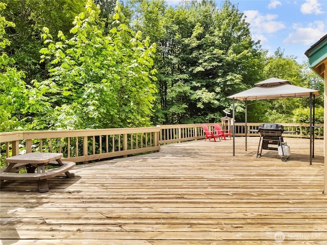 7842 Delphi Rd SW, Olympia, WA 98512 - wooden terrace featuring a gazebo and grilling area