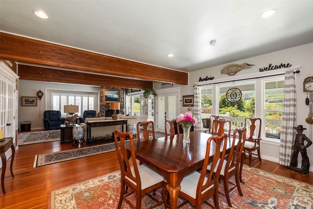 281 Jarvis Rd, Mossyrock, WA 98564 - dining area featuring recessed lighting, beam ceiling, wood finished floors, french doors, and a stone fireplace