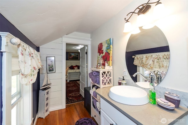 281 Jarvis Rd, Mossyrock, WA 98564 - bathroom featuring hardwood / wood-style floors, vaulted ceiling, and vanity