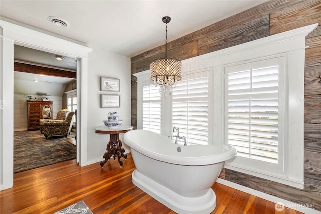 281 Jarvis Rd, Mossyrock, WA 98564 - full bath with a freestanding bath, wood finished floors, and a chandelier