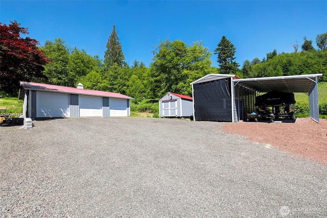 281 Jarvis Rd, Mossyrock, WA 98564 - detached garage featuring a storage shed and a carport