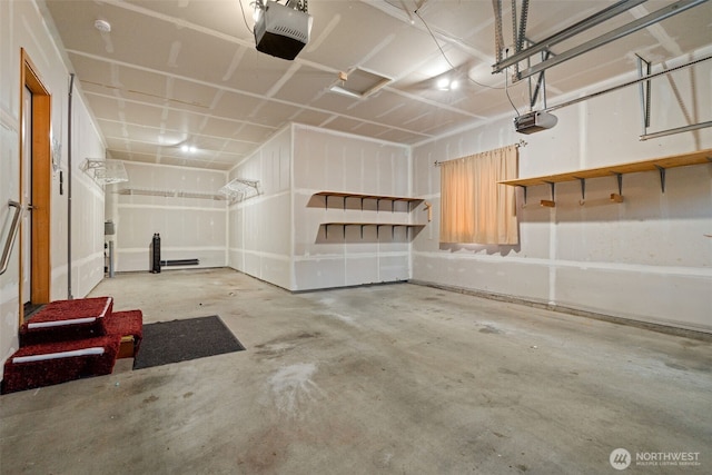 18130 Sunrise Ridge Ave NE, Poulsbo, WA 98370 - garage with a garage door opener