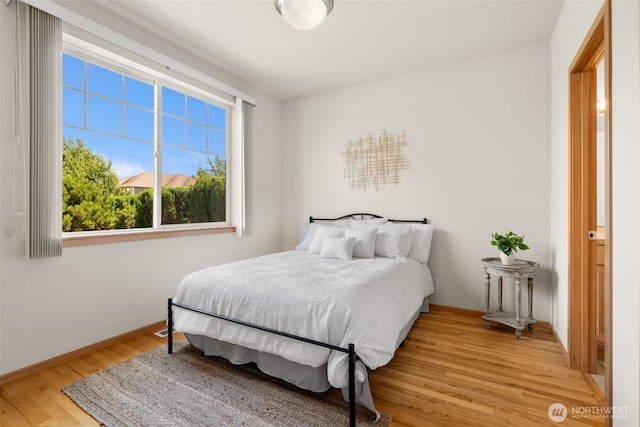 18130 Sunrise Ridge Ave NE, Poulsbo, WA 98370 - bedroom with light wood-style floors and baseboards
