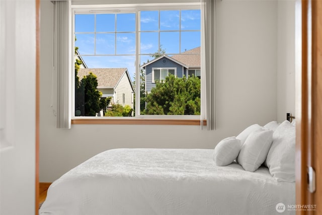 18130 Sunrise Ridge Ave NE, Poulsbo, WA 98370 - bedroom featuring multiple windows