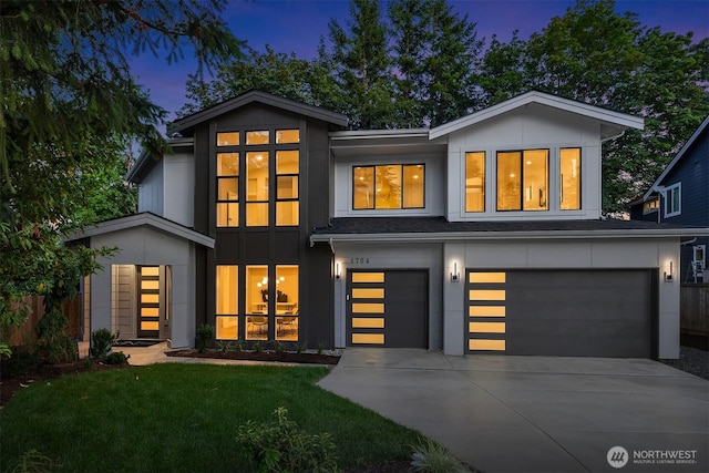 1704 172nd Ct NE, Bellevue, WA 98008 - rear view of house featuring a garage and driveway