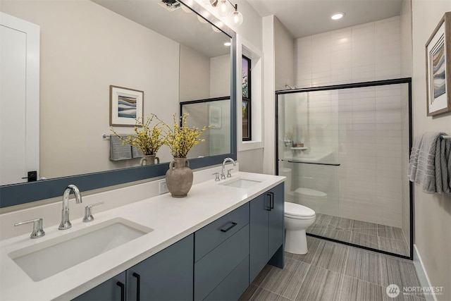 1704 172nd Ct NE, Bellevue, WA 98008 - full bath with double vanity, a tile shower, and recessed lighting