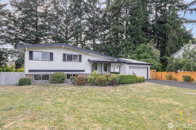 14249 NE 1st St, Bellevue, WA 98007 - split level home with asphalt driveway and a garage