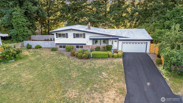 14249 NE 1st St, Bellevue, WA 98007 - split level home with a garage, asphalt driveway, and brick siding
