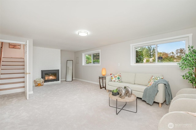 14249 NE 1st St, Bellevue, WA 98007 - living area featuring stairs, a large fireplace, and carpet floors