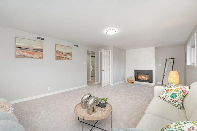 14249 NE 1st St, Bellevue, WA 98007 - living room featuring a large fireplace and carpet flooring