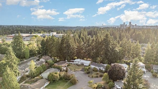 14249 NE 1st St, Bellevue, WA 98007 - aerial view of property and surrounding area featuring a heavily wooded area