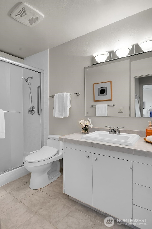 500 W Olympic Pl Unit 401, Seattle, WA 98119 - bathroom with vanity and a stall shower