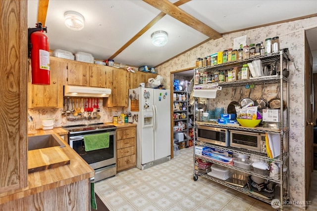 18025 Cedar Ponds Rd, Monroe, WA 98272 - kitchen with stainless steel electric stove, under cabinet range hood, white fridge with ice dispenser, butcher block countertops, and light flooring