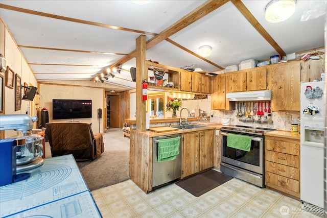 18025 Cedar Ponds Rd, Monroe, WA 98272 - kitchen with appliances with stainless steel finishes, under cabinet range hood, open floor plan, light countertops, and light floors