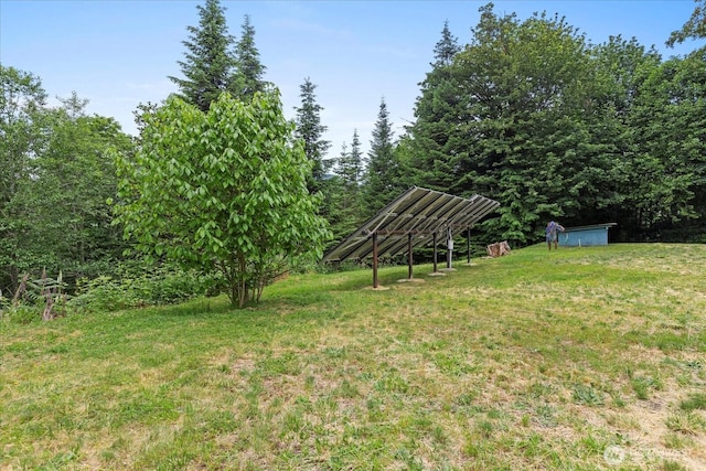18025 Cedar Ponds Rd, Monroe, WA 98272 - view of green lawn featuring an outbuilding