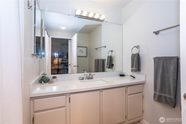 4231 NE 5th St Unit C102, Renton, WA 98059 - bathroom featuring vanity and toilet