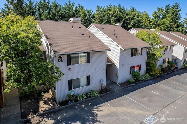 4231 NE 5th St Unit C102, Renton, WA 98059 - view of front facade with roof with shingles