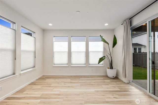 12619 176th St E, Puyallup, WA 98374 - unfurnished sunroom with wood finished floors and recessed lighting