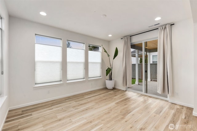 12619 176th St E, Puyallup, WA 98374 - empty room featuring wood finished floors and recessed lighting