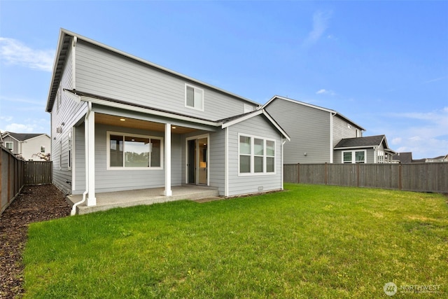 12619 176th St E, Puyallup, WA 98374 - rear view of house with a fenced backyard and a patio area