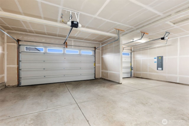 12619 176th St E, Puyallup, WA 98374 - garage featuring a garage door opener and electric panel